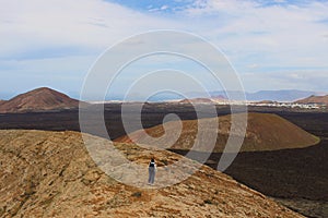 The vastness of Timanfaya Park Lanzarote Ã¢â¬â Canary Islands Ã¢â¬â Spain seen from the top of a volcan photo